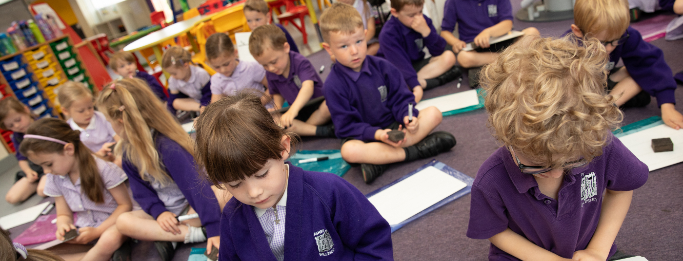 Children in EYFS enjoying phonics